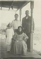 Grandma Gray (seated), Flossie? (child),  Mary Belle Turner Ferguson, and Pinkney Ferguson.